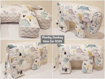 Plonky Donkey Breastfeeding/Tummy Time Pillow (white with dinosaurs & grey zig zags on the side)