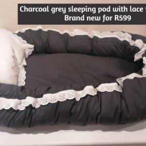 Charcoal grey sleeping pod with lace trimming